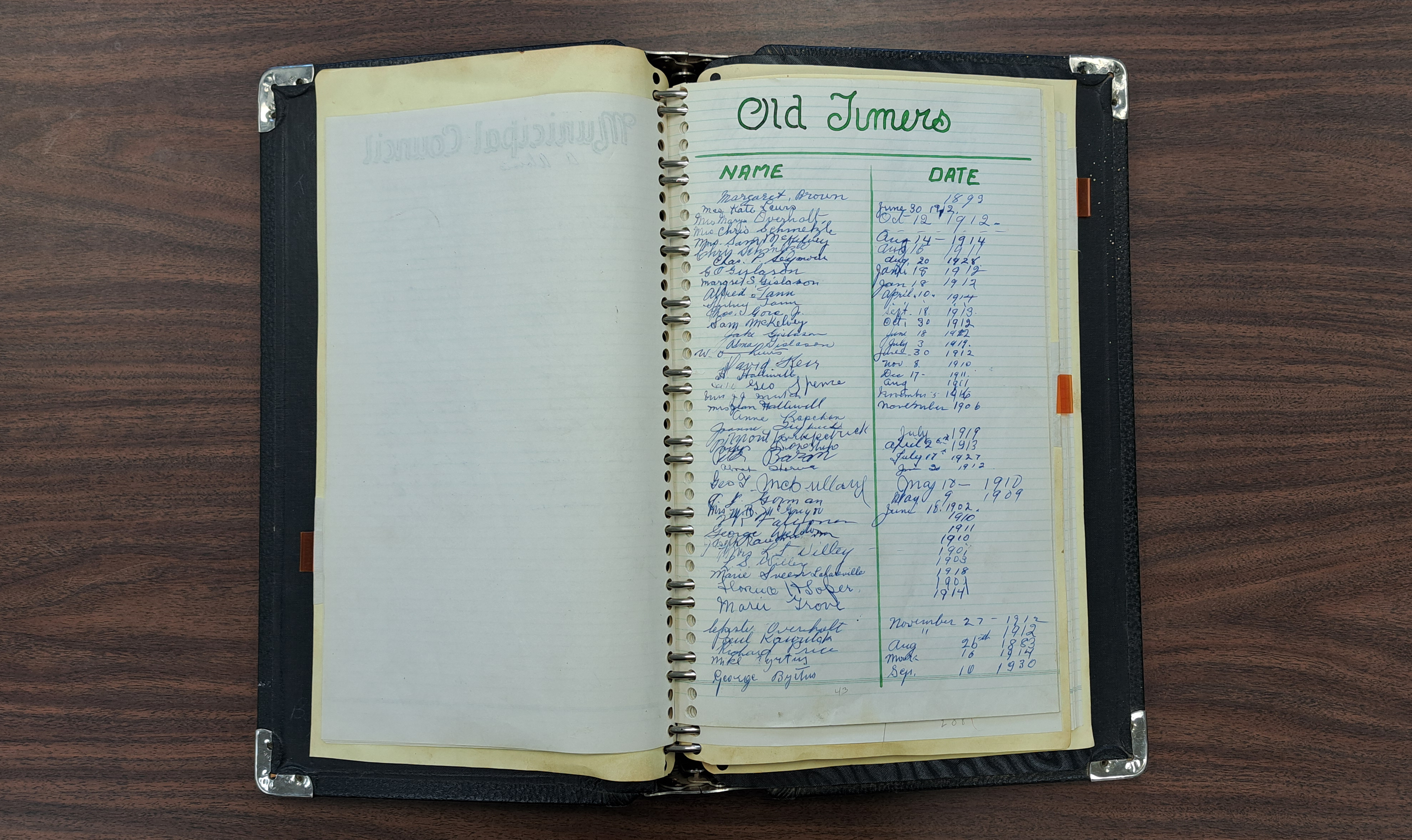 photo of a large ringed binder open to a page labeled 